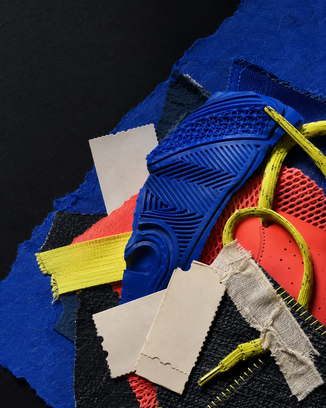 Diagonal match-day collage of mesh, court-shoe tread, laces, tape and supporter ephemera
